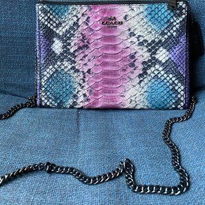 Faux snakeskin coach crossbody clutch